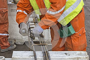 Workers tying rebar