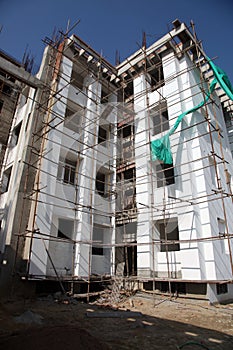 Workers under construction building project