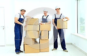 Workers unload boxes