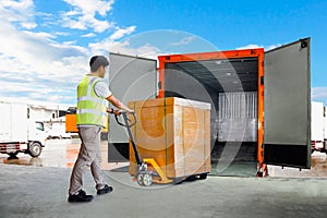 Workers Unloading Heavy Pallet Boxes into Container Truck. Loading Dock Warehouse. Supply Chain, Warehouse Shipping.