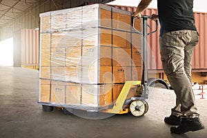 Workers Unloading Package Boxes on Pallet in Warehouse. Delivery. Supply Chain Shipment Goods. Distribution Supplies Warehouse