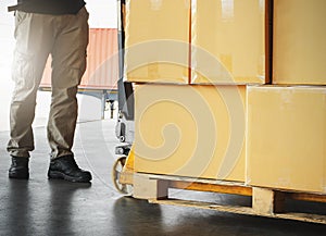 Workers Unloading Package Boxes on Pallet in Warehouse. Supply Chain Shipment Goods. Supplies Warehouse Shipping Logistics.