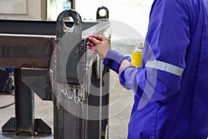 Workers use cleaner for remove the penetrant..This is second step of Penetrant Testing PT.