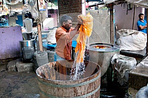 Workers washing clothes at Dhobi Ghat in Mumbai, Maharashtra, In