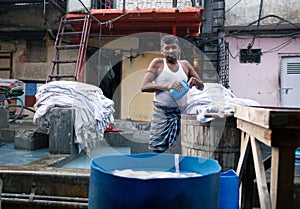 Workers washing clothes at Dhobi Ghat in Mumbai, Maharashtra, In