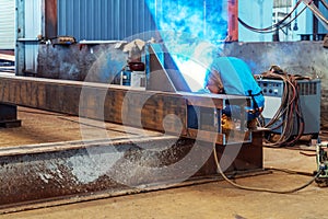 Workers at work, ongoing welding operation