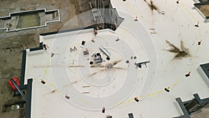 Workers work on the roof Large construction site, Construction of modern residential buildings.