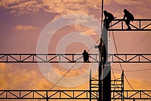 Workers working at twilight