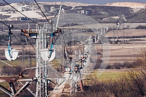 Working Aerial Ropeway Carrying White Stone to the Plant