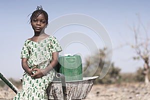 Working African ethnicity Infant getting pure Water in a natural environment