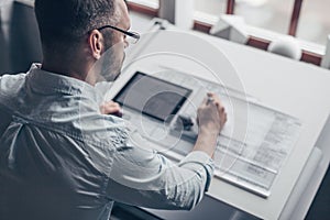 Working architect at the desk