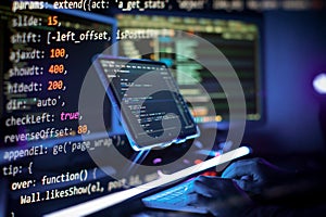 Working atmosphere of a programmer at home . ?oding html and programming on screen laptop, development web