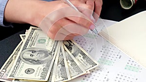 Working businesswoman hands at office workplace desk. Counting money for salary. Investment savings. Finances, economy