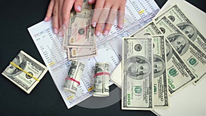 Working businesswoman hands at office workplace desk. Counting money for salary. Investment savings. Finances, economy