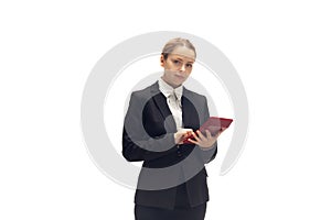 Young woman, accountant, booker in office suit isolated on white studio background photo