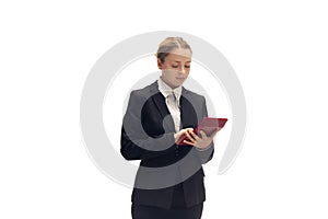 Young woman, accountant, booker in office suit isolated on white studio background