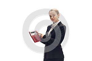 Young woman, accountant, booker in office suit isolated on white studio background photo