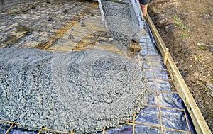 working concreting a path around a house