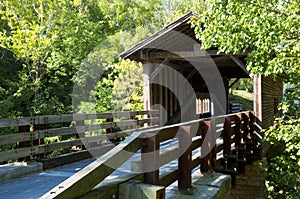 Working covered bridge in summer.