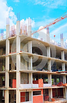 Working and Crane in big construction site in develop city with copy space add text