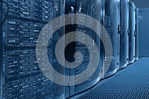 Operational server racks. Modern high-tech telecommunications database super computer in a room