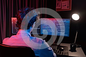 IT developer creating online software information coding on pc screen. Gusher.