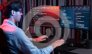 IT developer creating online software information coding on pc screen. Gusher.