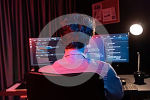 IT developer creating online software information coding on pc screen. Gusher.