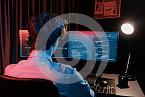 IT developer creating online software information coding on pc screen. Gusher.