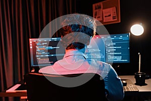 IT developer creating online software information coding on pc screen. Gusher.