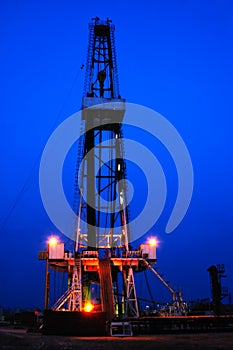 Working drilling rig in night