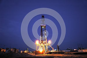 Working drilling rig in night