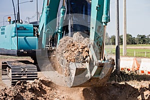 Working Excavator Tractor Digging A Trench.