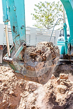 Working Excavator Tractor Digging A Trench.