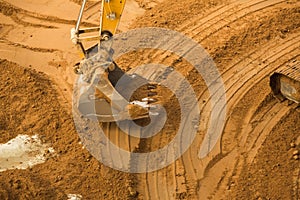 Working Excavator Tractor Digging A Trench.