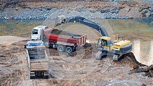 Working excavator tractor digging a trench