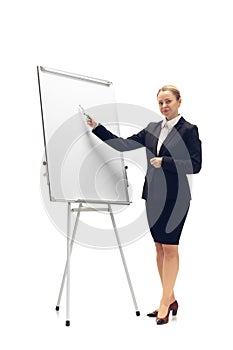 Young woman, accountant, booker in office suit isolated on white studio background photo