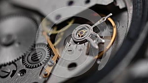 Working gear mechanism of an old wrist watch in macro. Close-up