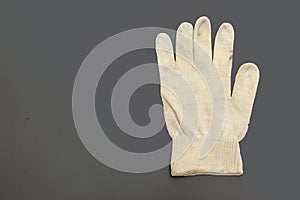 Working glove with stretchable cuff on dirty background, clipping path