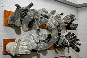 Working gloves at the wall