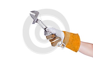 Working hand in glove holding wrench