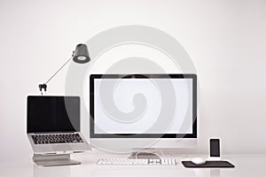 Working hard on a brand new design. Cropped shot of a handsome young man working on his laptop in an office.