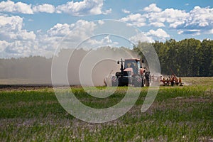 Working Harvesting Combine in the Field of Wheat