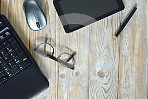 Working at home office on a laptop computer and empty copy space