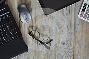 Working at home office on a laptop computer and empty copy space