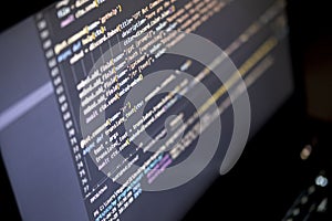 Working hours programming. The programmer prints new lines of HTML