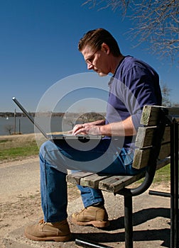 Working on Laptop in Park