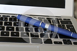 Working on laptop with stylish stylus