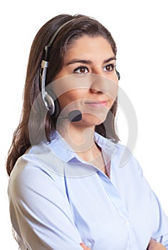 Working latin businesswoman with headset