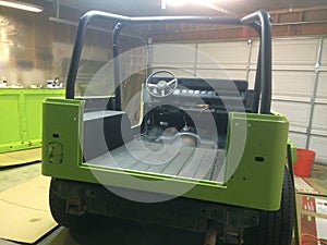 Working on Lime Green Paint Job, 1990s 4x4 Vehicle photo